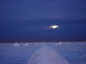 Moon above Salar de Uyuni Bolivia tour