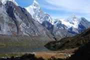 Hiking past snowcapped mountains