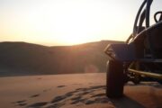 Sunset sandboarding, buggy tour