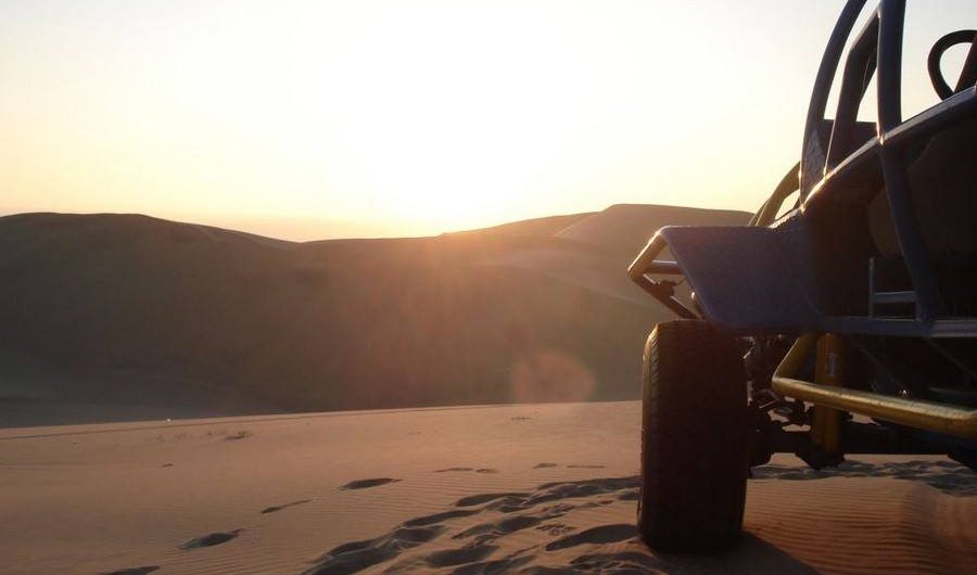 Sunset sandboarding, buggy tour