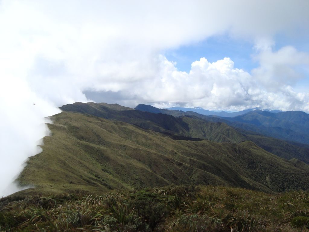 A white line of clouds on the mountain